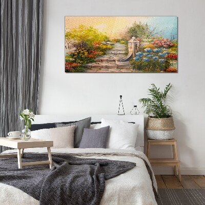 Glasbild Blumengarten mit Springbrunnen