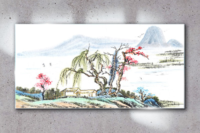 Glasbild Eine friedliche Landschaft mit Bäumen und einem Haus