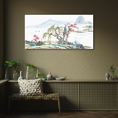 Glasbild Eine friedliche Landschaft mit Bäumen und einem Haus