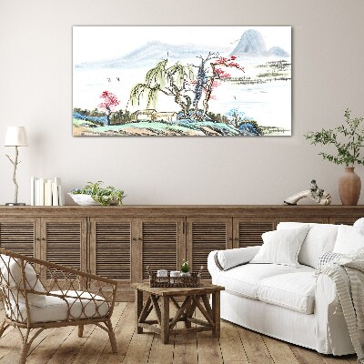 Glasbild Eine friedliche Landschaft mit Bäumen und einem Haus