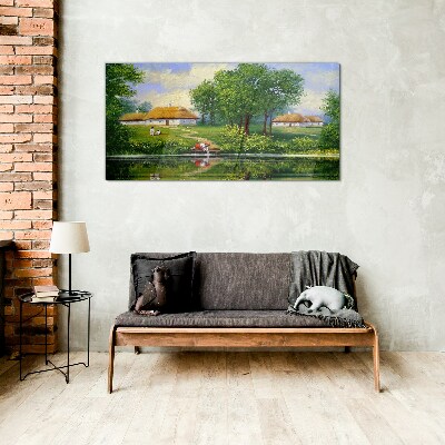 Glasbild Friedliche ländliche Landschaft am Wasser