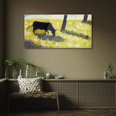 Bild auf glas Eine Kuh grast in einer grünen Landschaft