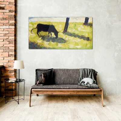 Bild auf glas Eine Kuh grast in einer grünen Landschaft