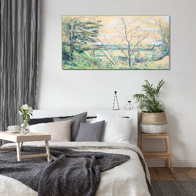 Glasbild Eine friedliche Landschaft mit Bäumen