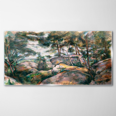 Glasbild Eine steinige Landschaft zwischen Bäumen
