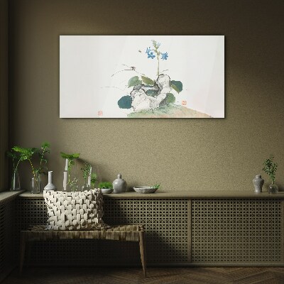 Glasbild Blume auf einem Steinhintergrund