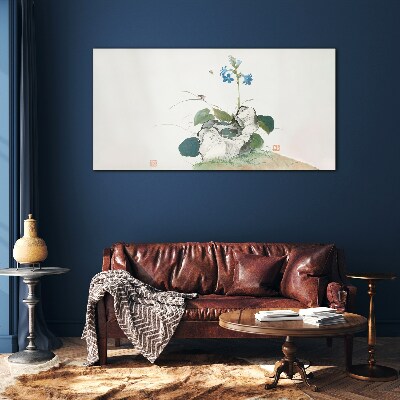 Glasbild Blume auf einem Steinhintergrund