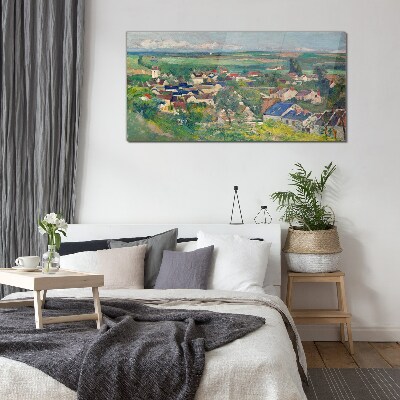 Glasbild Blick auf das Dorf bei Tageslicht