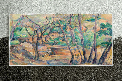 Glasbild Landschaft zwischen den Bäumen
