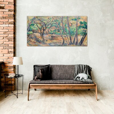 Glasbild Landschaft zwischen den Bäumen