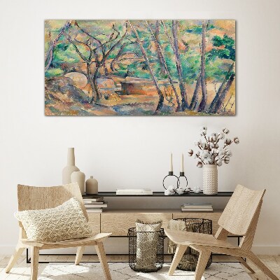Glasbild Landschaft zwischen den Bäumen