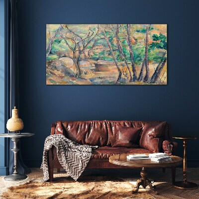 Glasbild Landschaft zwischen den Bäumen