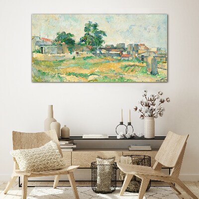 Glasbild Landschaft mit einem Baum und Gebäuden