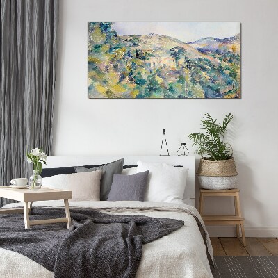 Glasbild Landschaft mit Häusern zwischen Bäumen