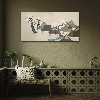 Glasbild Eine friedliche Landschaft mit Häusern und Bäumen