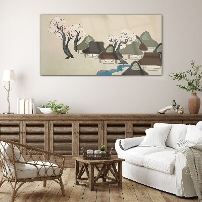 Glasbild Eine friedliche Landschaft mit Häusern und Bäumen
