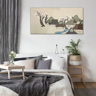 Glasbild Eine friedliche Landschaft mit Häusern und Bäumen