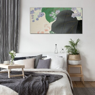 Glasbild Grünes Blatt mit Blumen