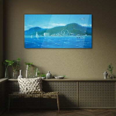 Glasbild Küstenlandschaft mit Vergnügungspark