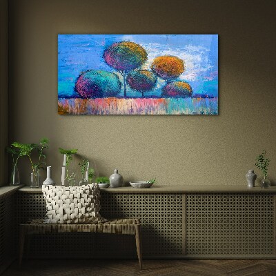 Foto auf glas Bunte Bäume auf blauem Hintergrund