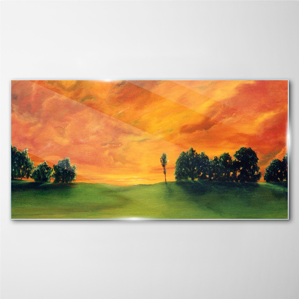 Glasbild Sonnenuntergang über dem grünen Hügel