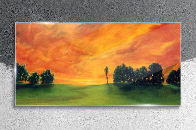 Glasbild Sonnenuntergang über dem grünen Hügel