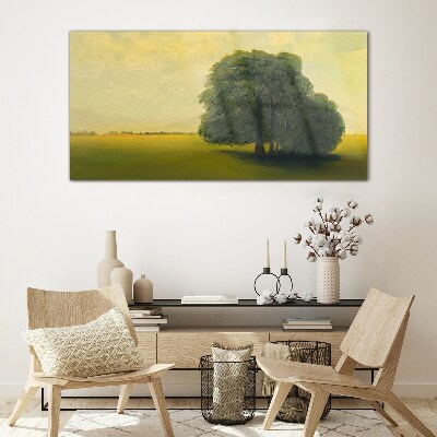 Glasbild Eine friedliche Landschaft mit einem Baum