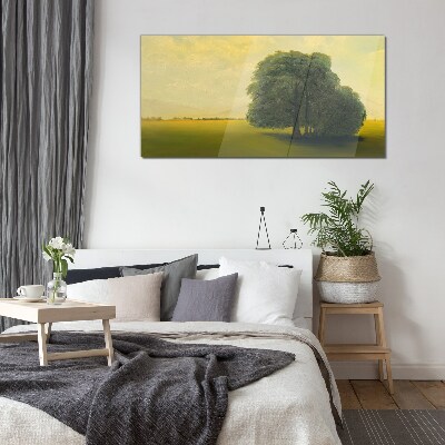 Glasbild Eine friedliche Landschaft mit einem Baum