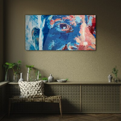 Glasbild Intensives Gesicht in Blautönen