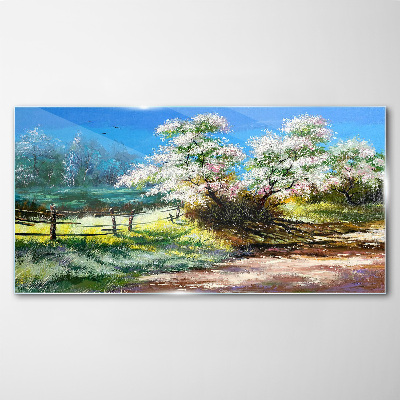 Glasbild Frühlingslandschaft mit blühenden Bäumen