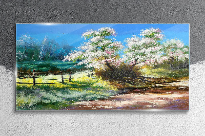 Glasbild Frühlingslandschaft mit blühenden Bäumen