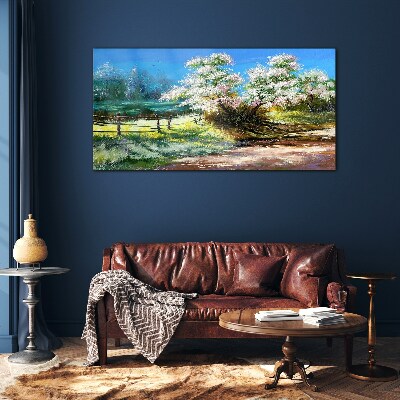 Glasbild Frühlingslandschaft mit blühenden Bäumen