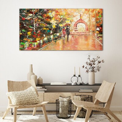 Glasbild Herbstliche Gasse mit Sonnenschirmen