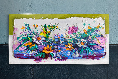 Glasbild Ein Blumenarrangement in intensiven Farben