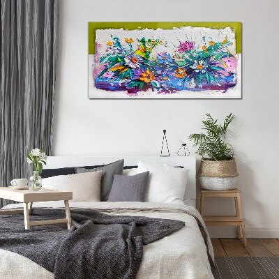Glasbild Ein Blumenarrangement in intensiven Farben