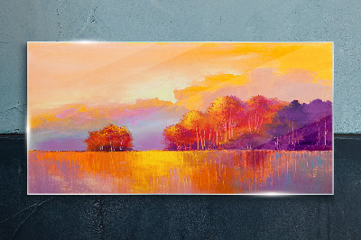 Glasbild Farbenprächtiger Sonnenuntergang über der Wiese