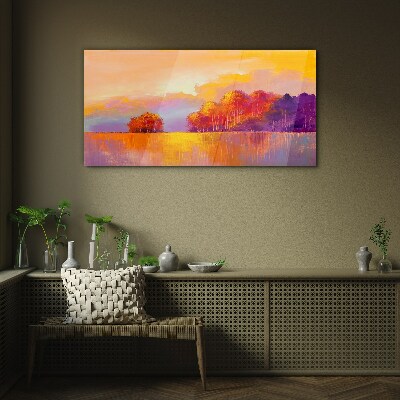 Glasbild Farbenprächtiger Sonnenuntergang über der Wiese