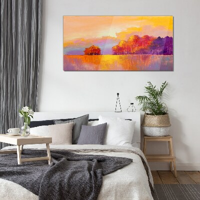 Glasbild Farbenprächtiger Sonnenuntergang über der Wiese
