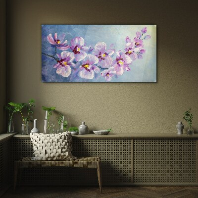 Glasbild Blumenorchideen auf blauem Hintergrund
