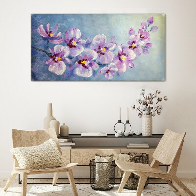 Glasbild Blumenorchideen auf blauem Hintergrund