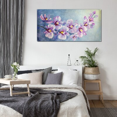Glasbild Blumenorchideen auf blauem Hintergrund