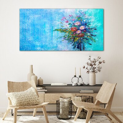 Glasbild Blumenkomposition auf blauem Hintergrund