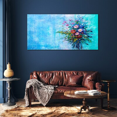 Glasbild Blumenkomposition auf blauem Hintergrund
