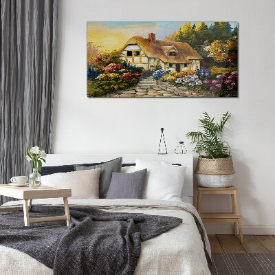 Glasbild Ein charmantes Landhaus in Blumen