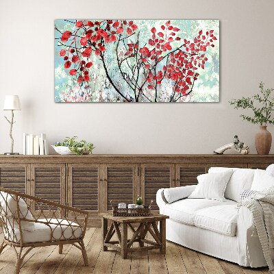 Glasbild Rote Blätter auf blauem Hintergrund