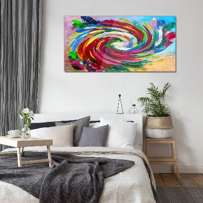 Glasbild Ein Wirbelwind der Farben