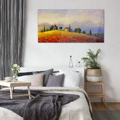 Glasbild Sonnige Landschaft mit Häusern auf einem Hügel