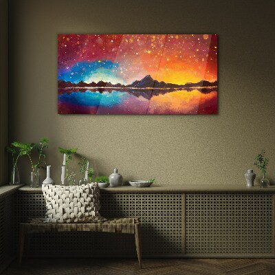 Glasbild Sonnenuntergang über einem Bergsee