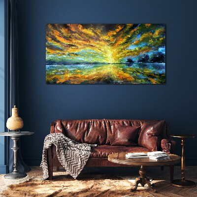 Glasbild Goldene Wolken über ruhigem Wasser