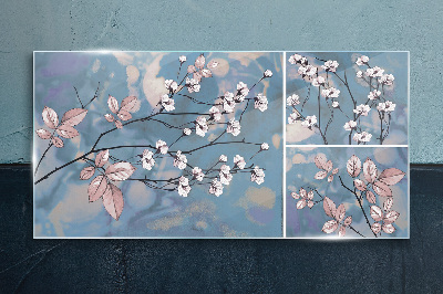 Glasbild Blumenzweige auf blauem Hintergrund